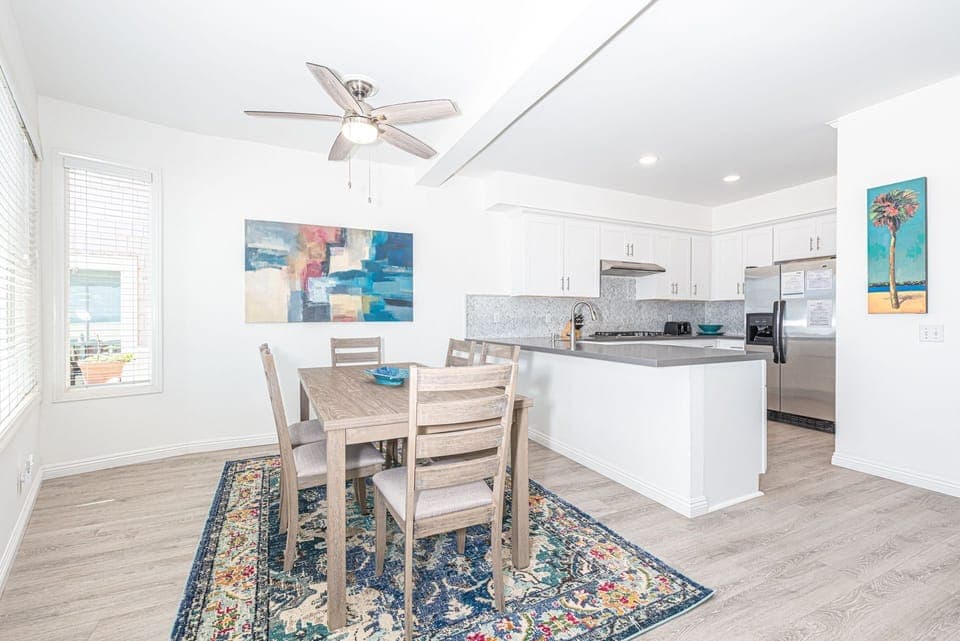 The kitchen opens out to the main dining area, making meal prep a social affair!
                