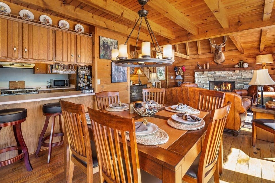 There's seating for dining at the table, at the breakfast bar, in the screened porch or at the bar on the deck