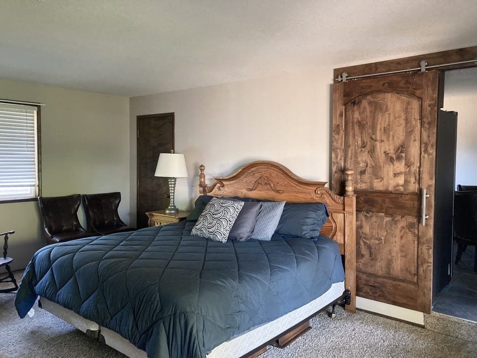 Guest room #3 with king bed and bunk bed