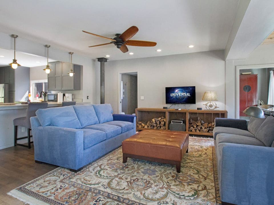 Newly updated living room furniture with Smart TV, dining for 6 and a wood fireplace for those cozy winter days.