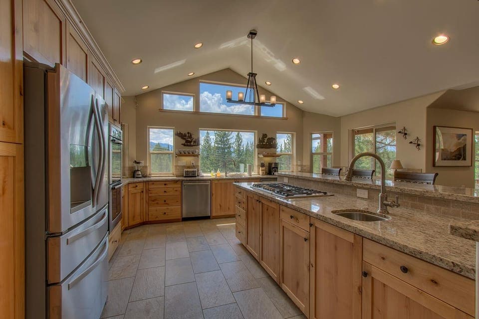 - Spacious kitchen with stainless steel appliances  
- Granite counters and mountain views through windows  
- Fully equipped space perfect for cooking together