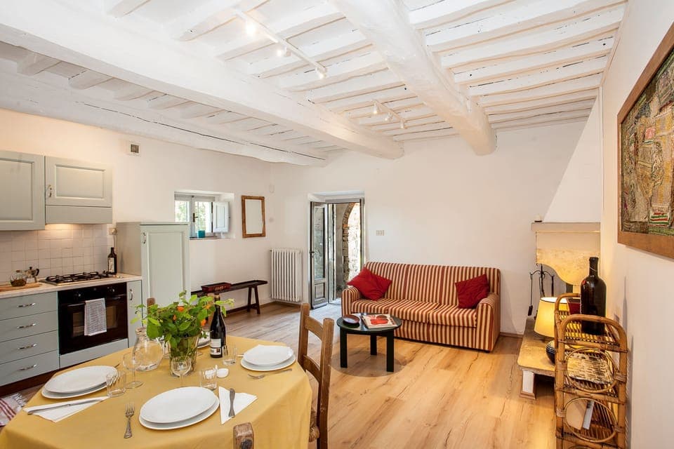 Living space with kitchen and fireplace