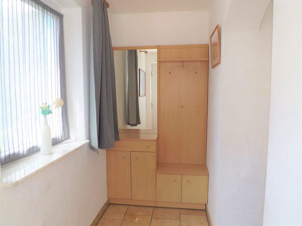 Entrance hallway with storage