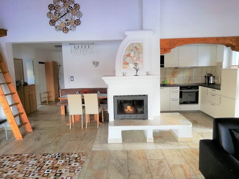 Living area, dining area and kitchen