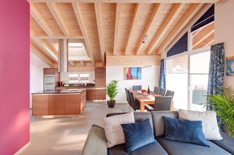 Overview of kitchen and open-plan living area.