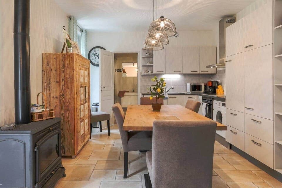 Ground floor kitchen, dining area, bathroom in the back ground