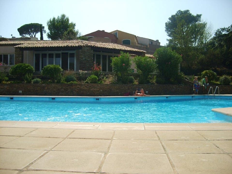 swimming pool only a few steps from the apartment