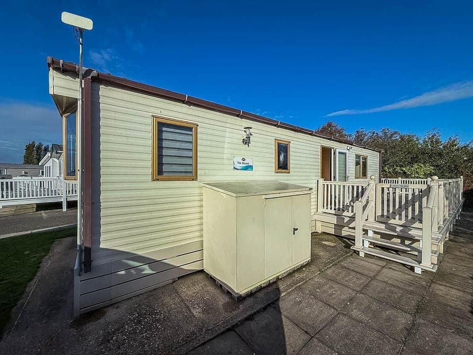 Cozy exterior with private deck for peaceful mornings