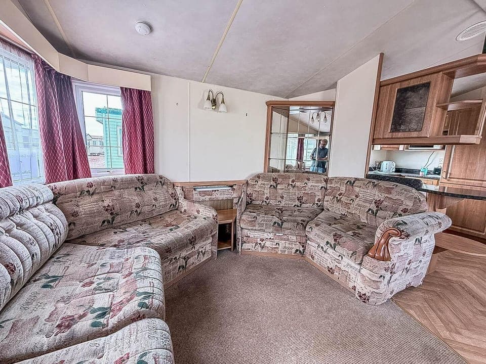 Cozy living room with plush sectional and natural light
