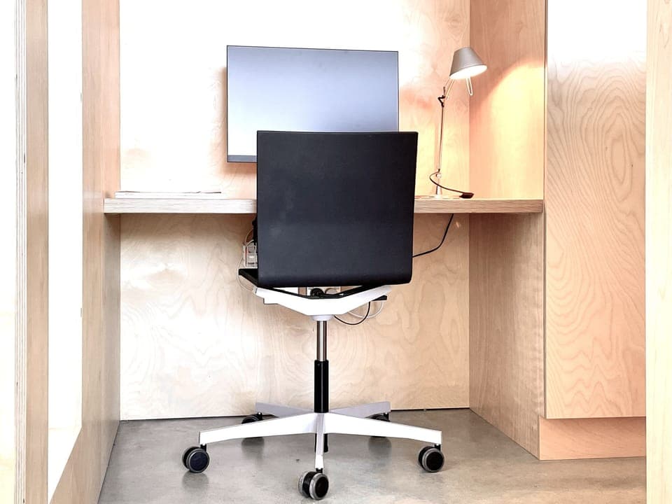 Work from home space with monitor discretely positioned in Master Bedroom