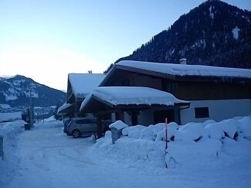 The track to the chalet and parking