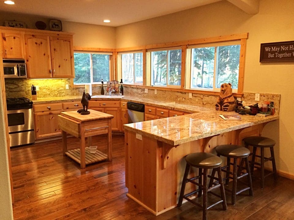 Granite counters  and chopping block island with plenty of  room to cook! 
