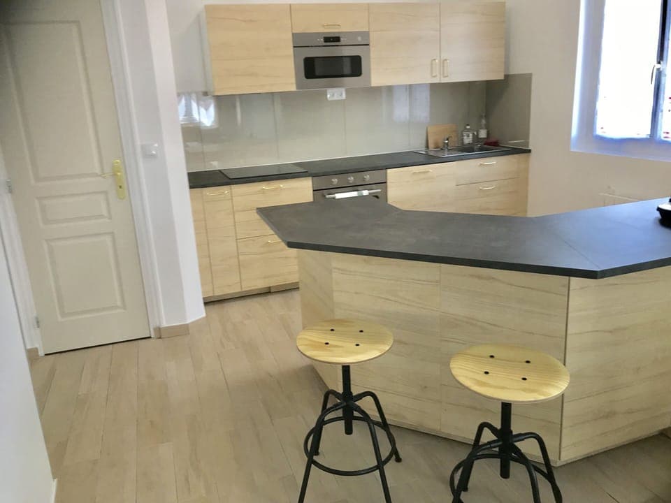 An opened and well fournished kitchen 
Dishes provided
