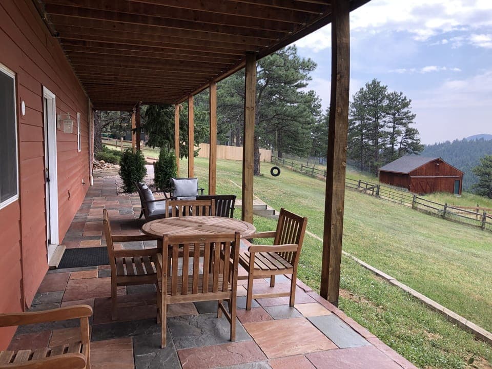 Private, outdoor patio with dining table, BBQ and conversational seating.