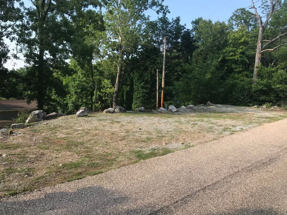 Parking slab at the top of the hill has plenty of room for cars and boats!