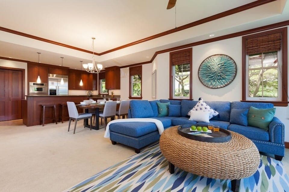 Open concept layout connects living room, dining, and kitchen