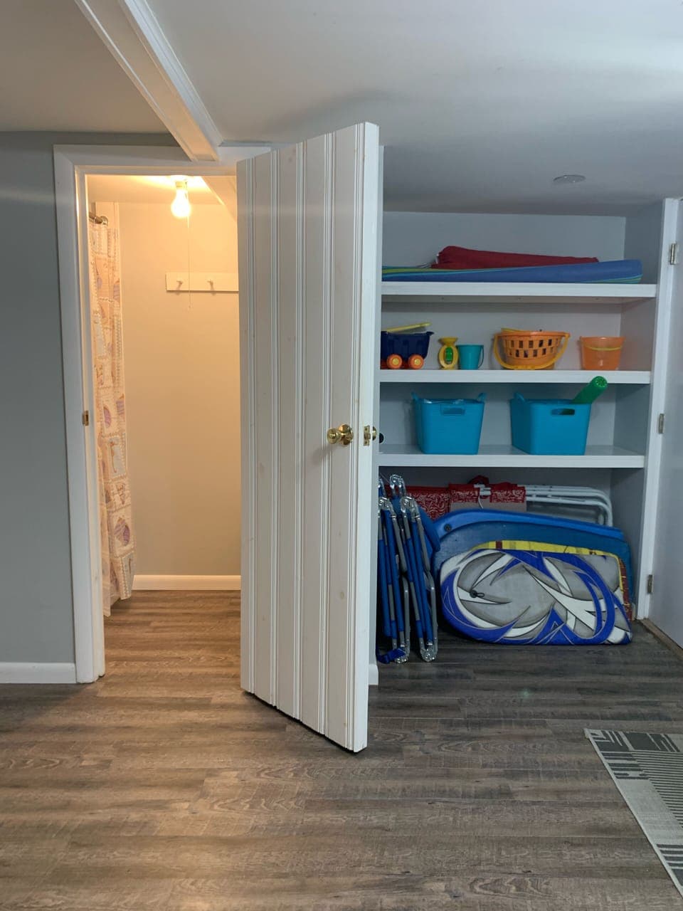 Beach toy/beach chair storage area. Beach shower  for easy rinse off!