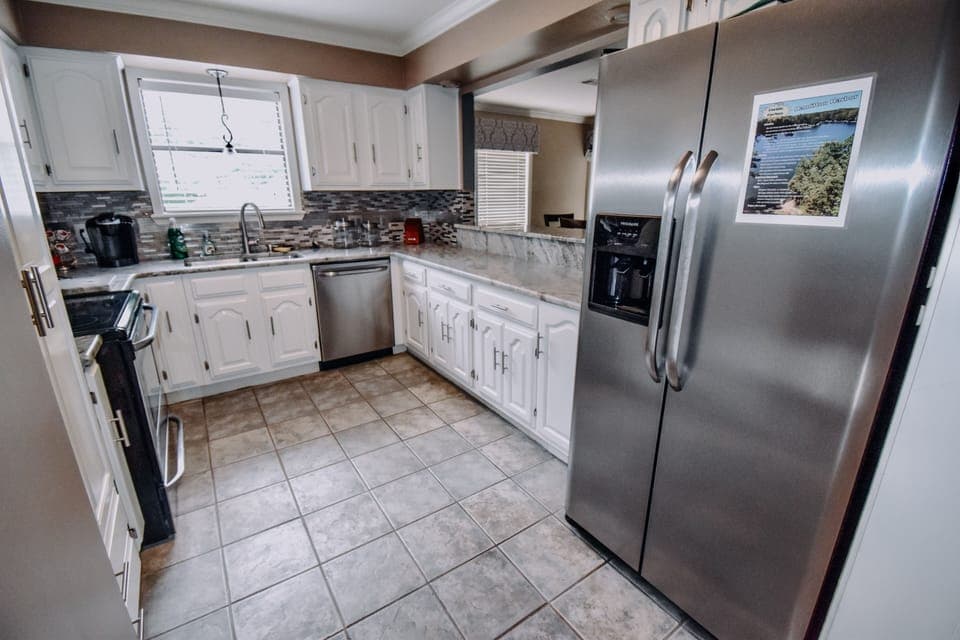 Fully equipped kitchen with opening into living room. (Open room concept)