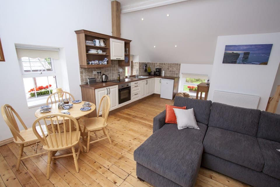 A bright comfortable living room with wonderful views from the sofa