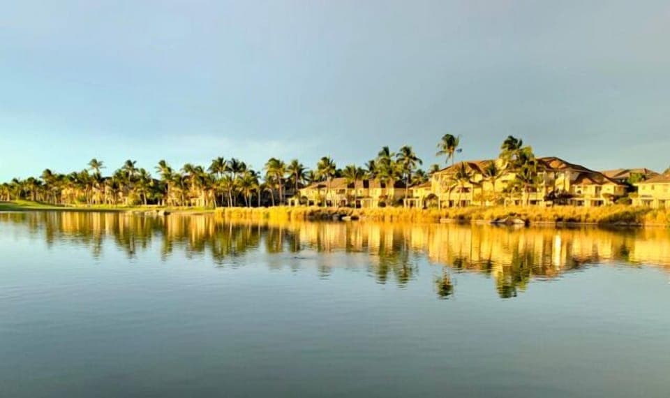 Fairway Villas reflected in the evening sun on Kings' Lake