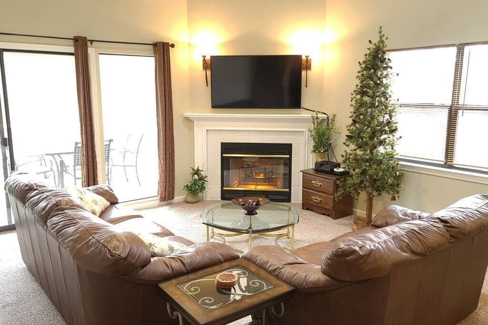 Living room with balcony access to the left.