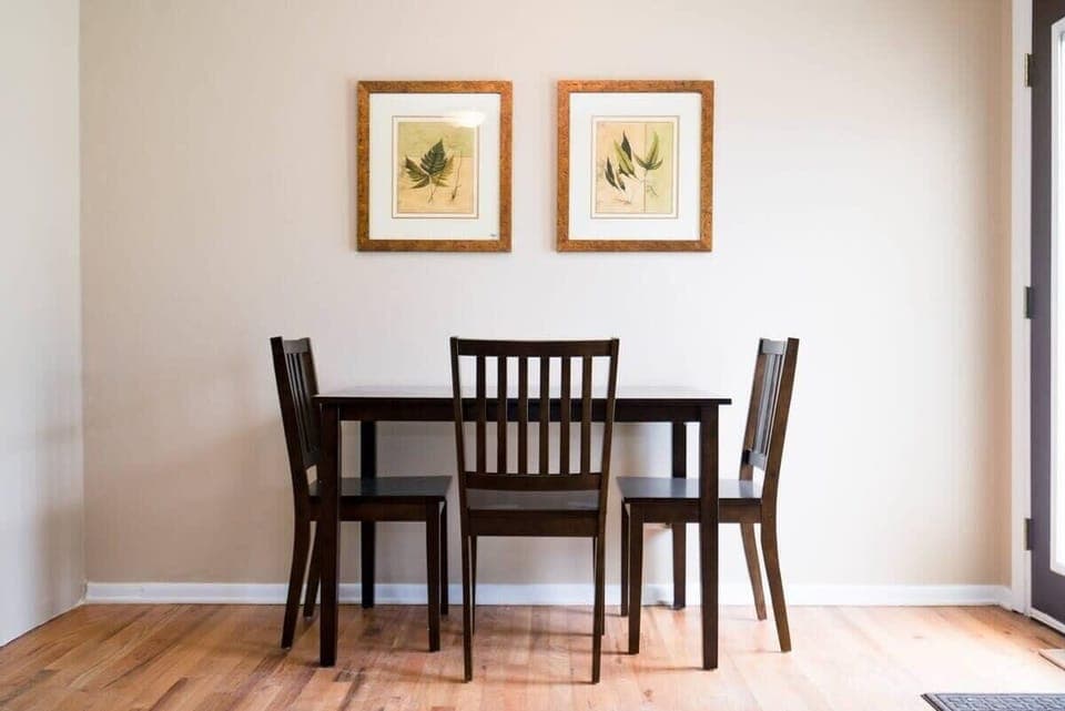 Sunlight from the backyard bathes the dining area.