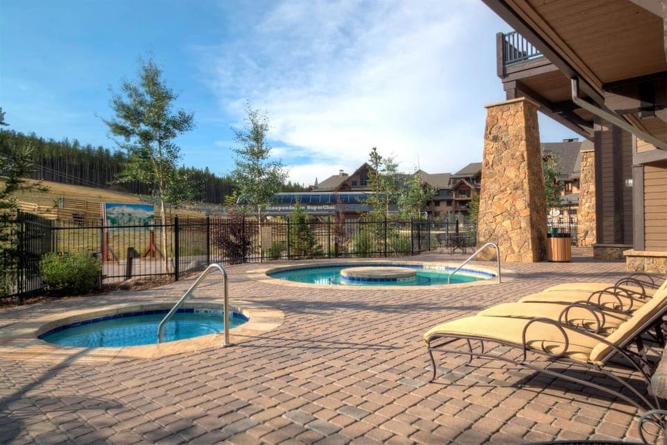 Relax in a slope-side hot tub at Crystal Peak Lodge
