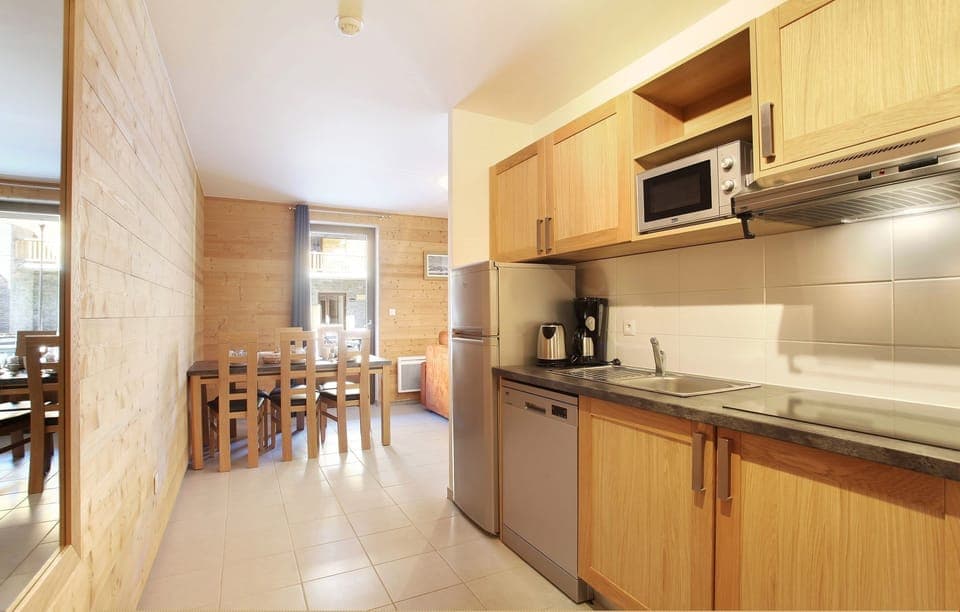 Prepare simple meals in the functional kitchenette.