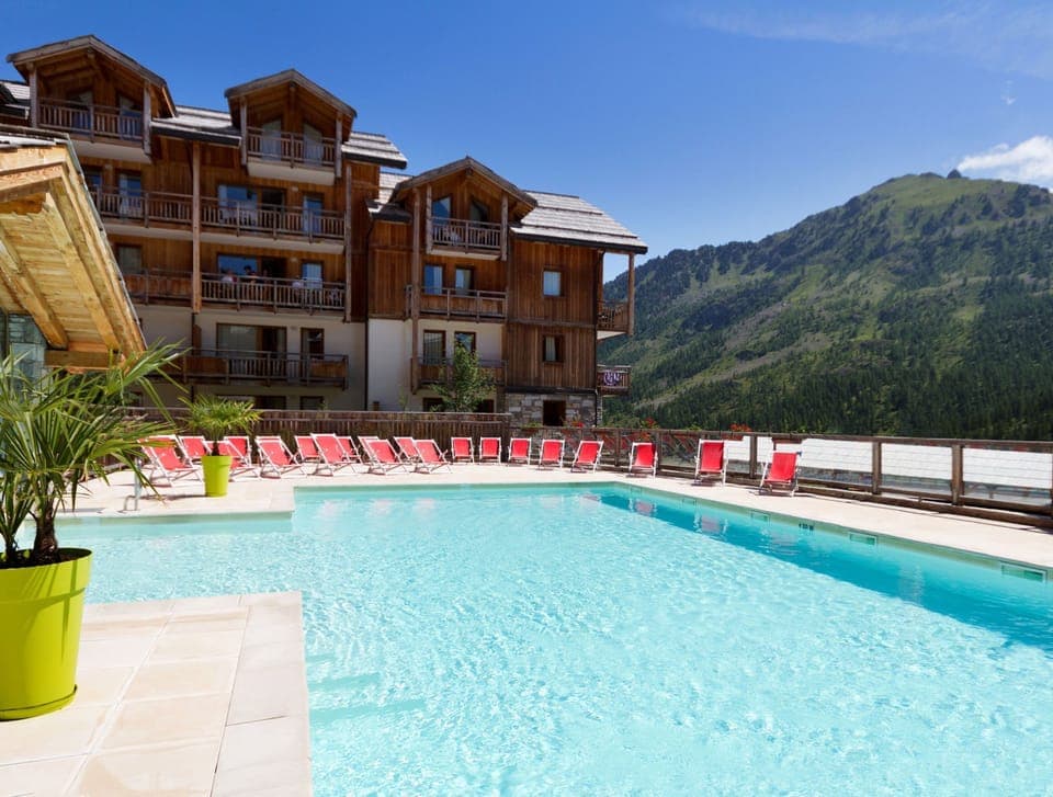 Lounge by the pool in the sunshine.