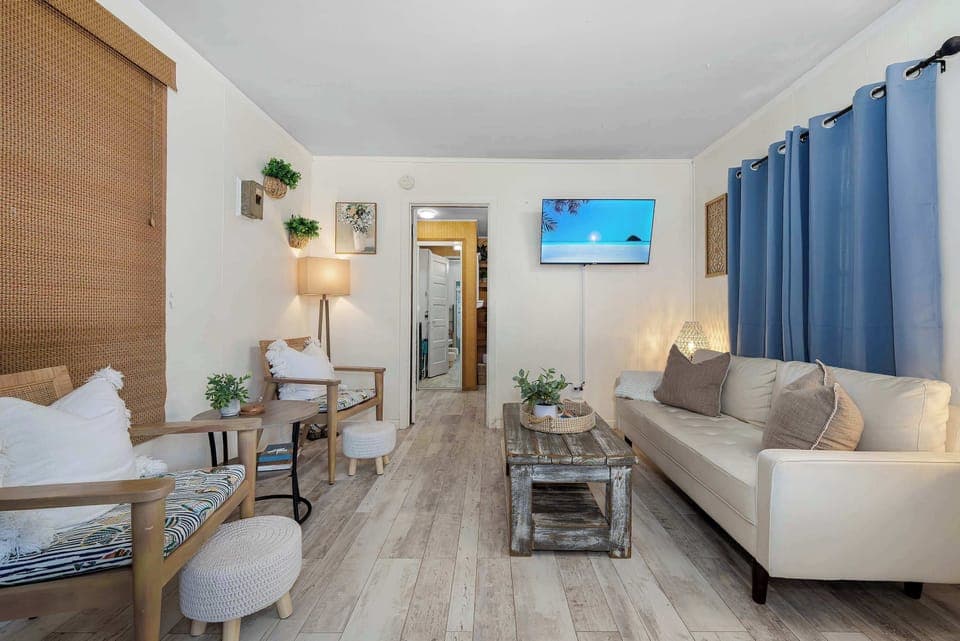 Living area includes a 42 inch Roku TV and board games