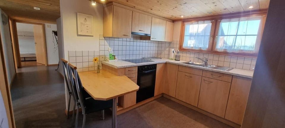 Kitchen with a view of the hallway
