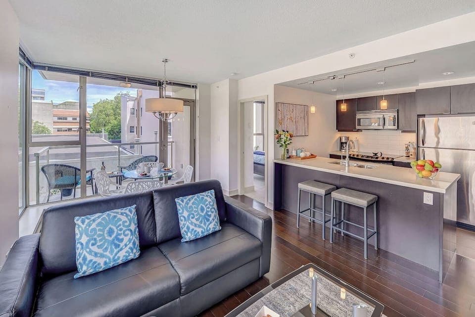 Bright and sunny living space, Natuzzi Italian Leather  Sofa, bar seating for 2.