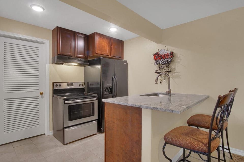 Kitchenette with full size appliances.