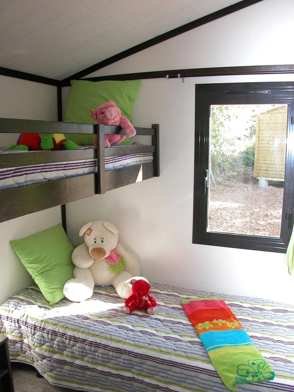 The second bedroom features a Bunk bed.