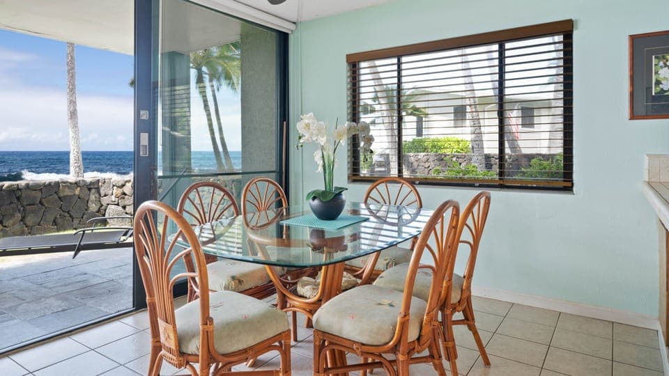 Dining area. Indoor dining space positioned to enjoy the ocean view while sharing meals or planning your island adventures.