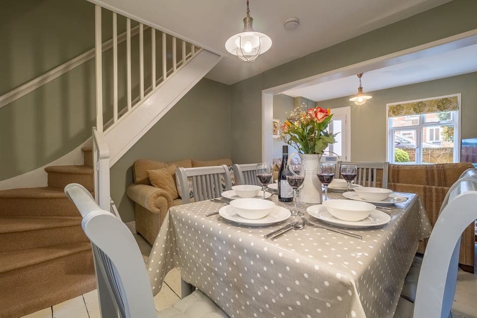Ground floor: Dining area and stairs to first floor