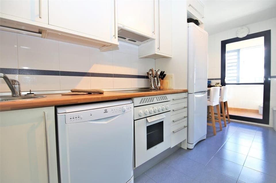 Kitchen is fully fitted with all the appliances and little laundry room to the back