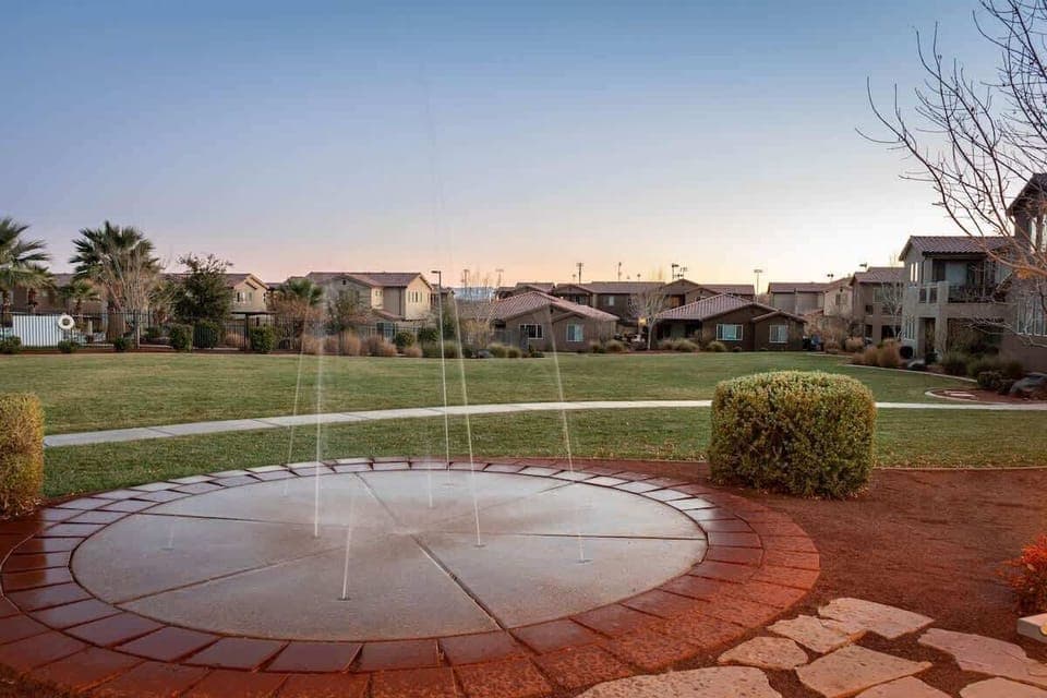 Kids love the private splash pad with huge poolside lawn to play
