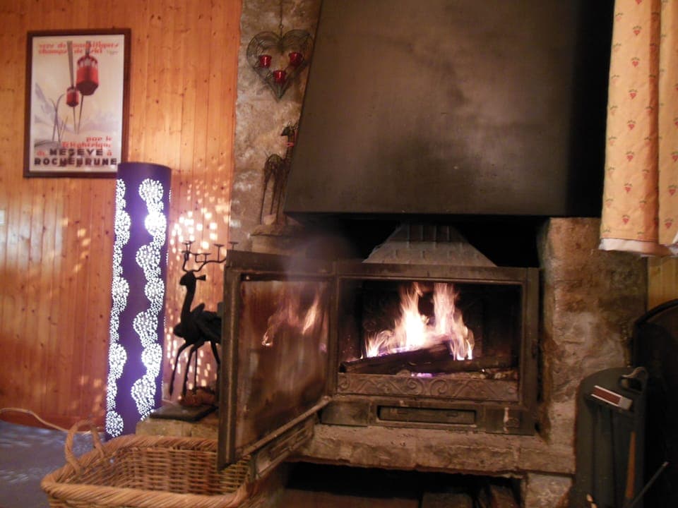 Woodburning fire in lounge.