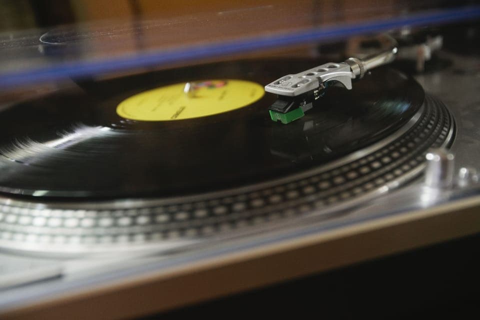 Turntable complete with an extensive collection of records from the last century