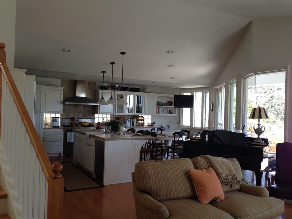 Great Room/Kitchen with sliders leading to outdoor living area