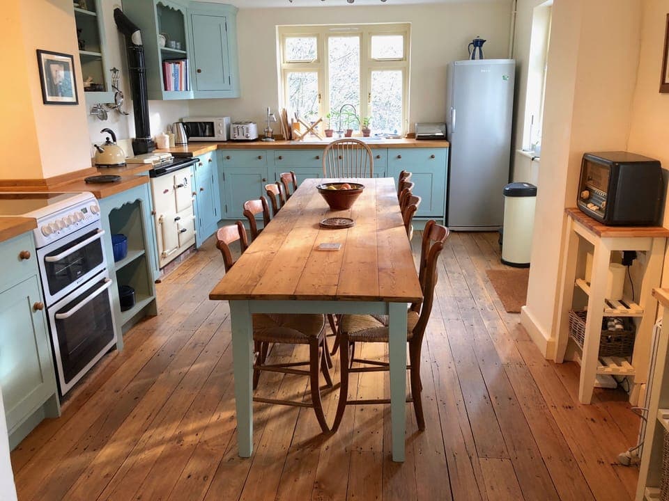 Well equipped farmhouse kitchen, with table seating up to 12 people