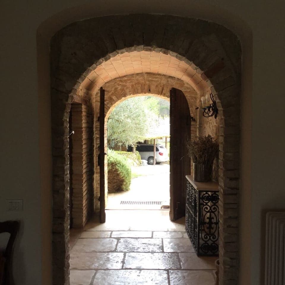 The fabulous medieval entrance to Alla Collina