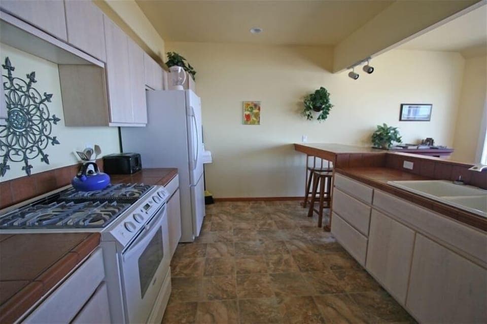 Kitchen 2nd Floor with Coffee Bar, all will a panoramic view of the Ocean.

