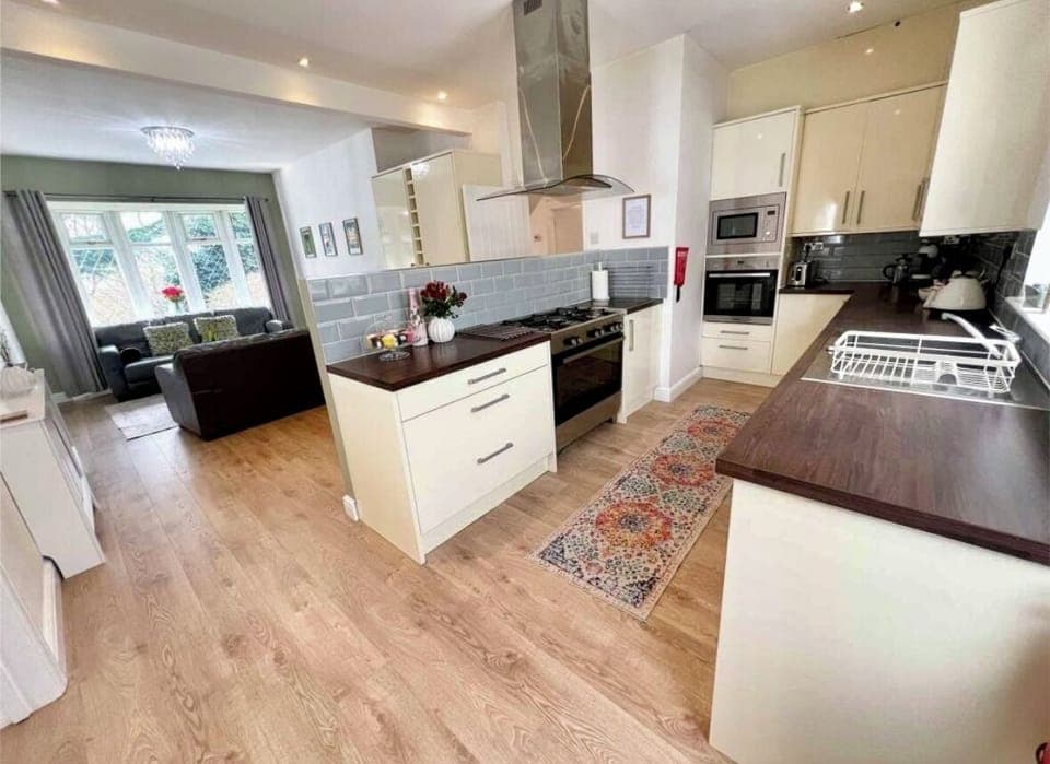 Large open plan kitchen, cosy area for entertaining and catching up with friends