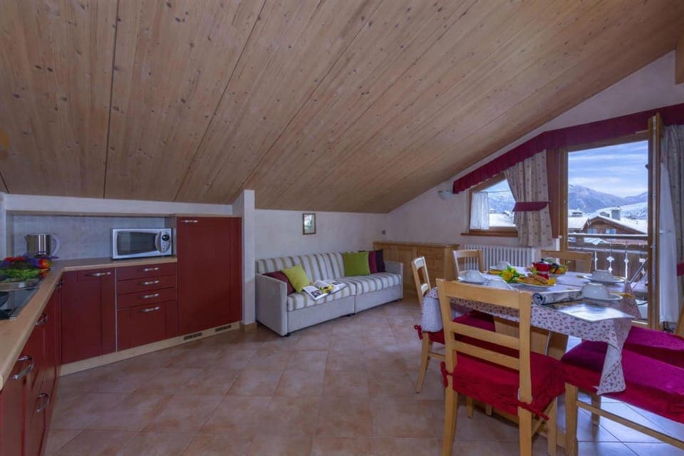Living room with kitchen and dining area