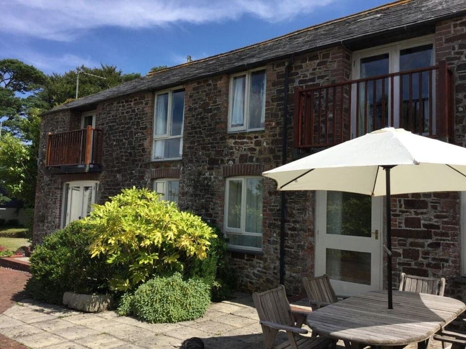 Barn with Coach on left and Stable to right