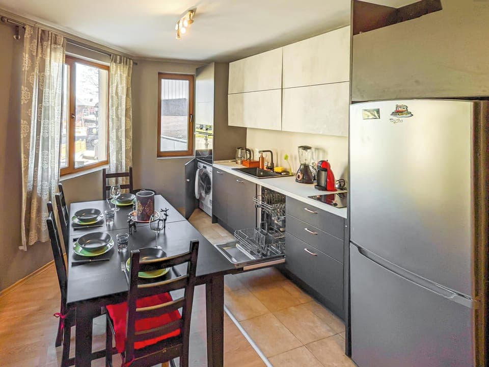 Kitchen equipped with microwave, oven, dishwasher, washing machine, 2 hob stove,