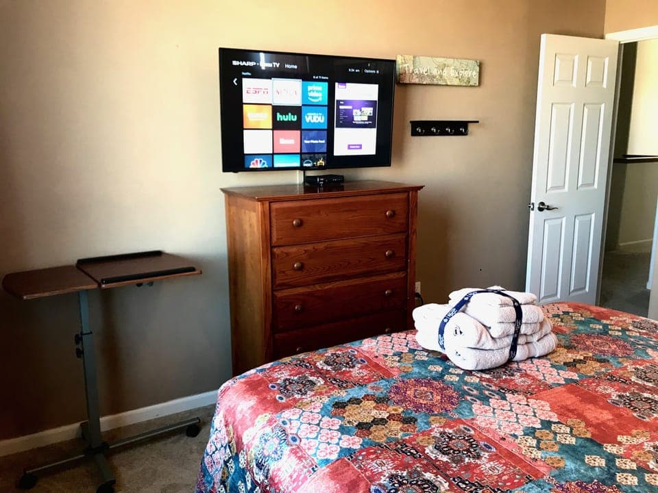Adjustable table, dresser. Adjustable bed lets you put your feet up.