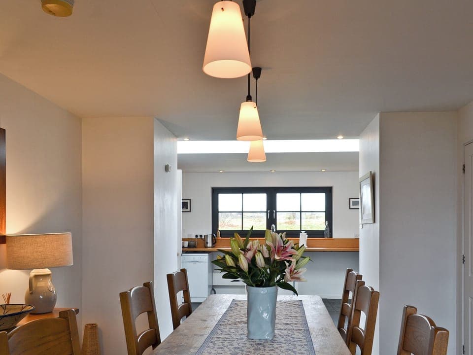 Spacious and stylish dining room with slate floor | Greep, Roag, Isle of Skye